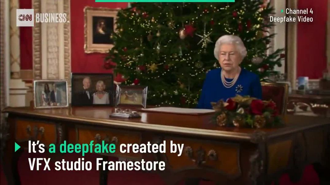 Фальш созданный в цифровом формате.Королева Англии станцевала на столе на рождество