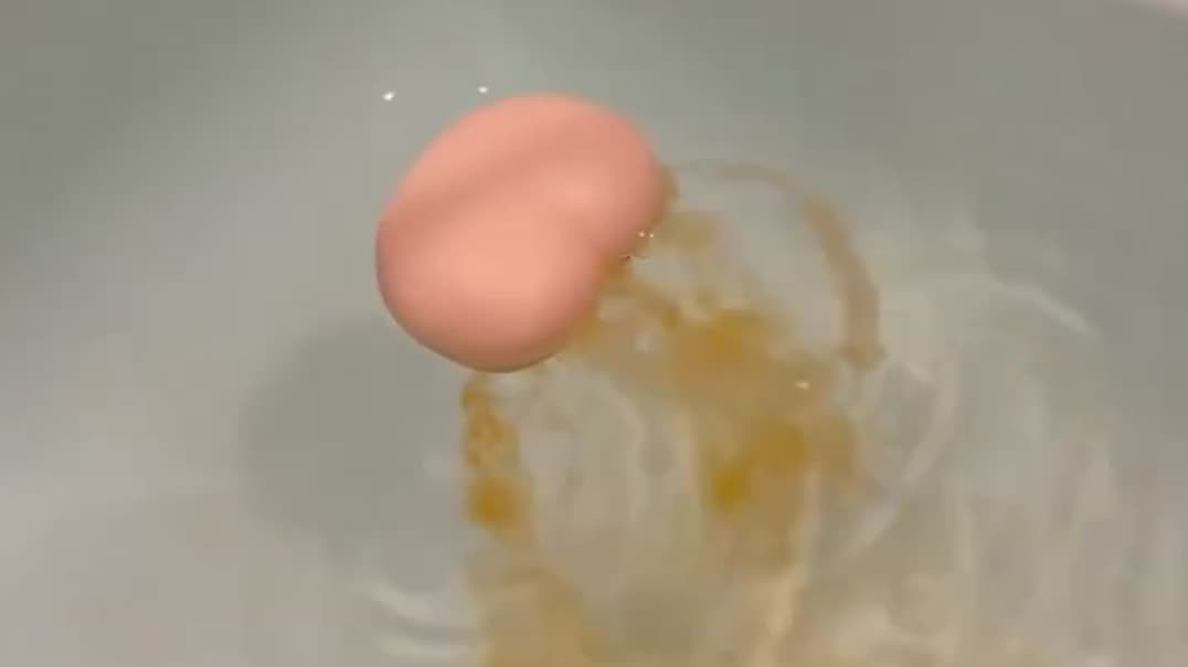 Funny Pink Bath Bomb Dissolving in Water 🛁💖
